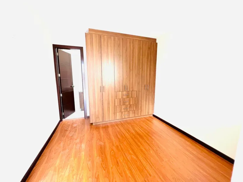 Bedroom with built-in wardrobe and new floor