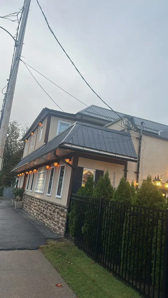 Mixed-use building with new metal roofs
