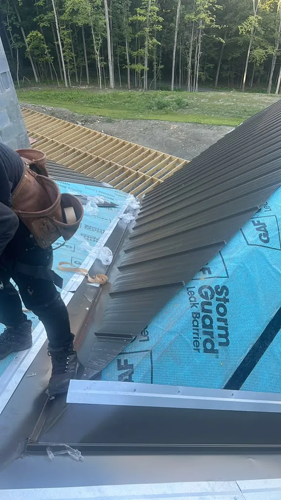 Metal roof panels going on over underlayment