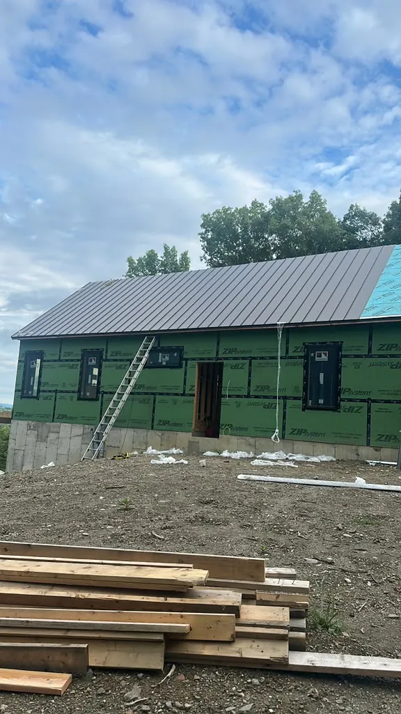 New Construction — New build — metal roof and house wrap