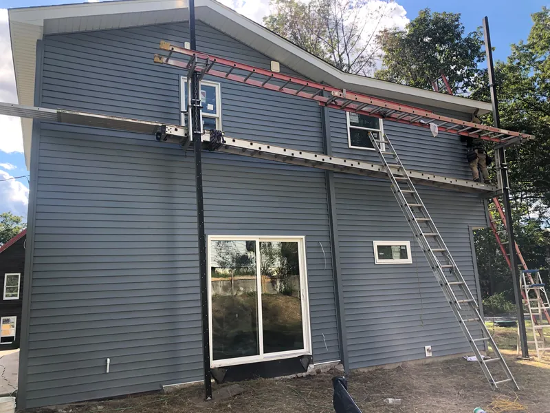 Two-story siding installation